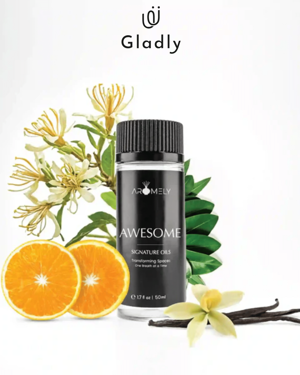 Self-care for busy people: Aromely “Awesome” signature essential oils bottle with orange slices, flowers, and vanilla pods (Gladly Shop).