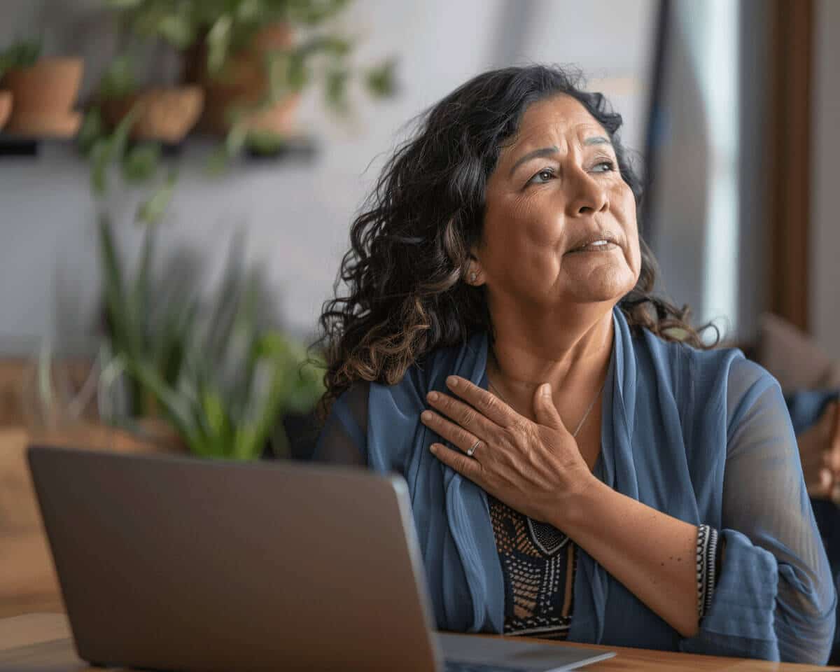 Busy person pausing at a laptop to practice self-care ideas Busy person pausing at a laptop to practice self-care ideas